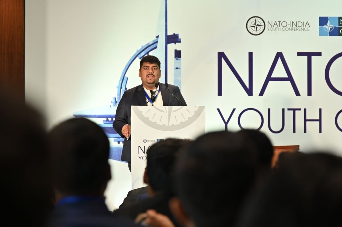 Asish Singh speaking at the NATO-India Youth Conference in New Delhi
